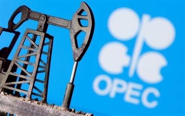 A 3D printed oil pump jack is seen in front of displayed Opec logo in this illustration picture, April 14, 2020. REUTERS/Dado Ruvic/Illustration