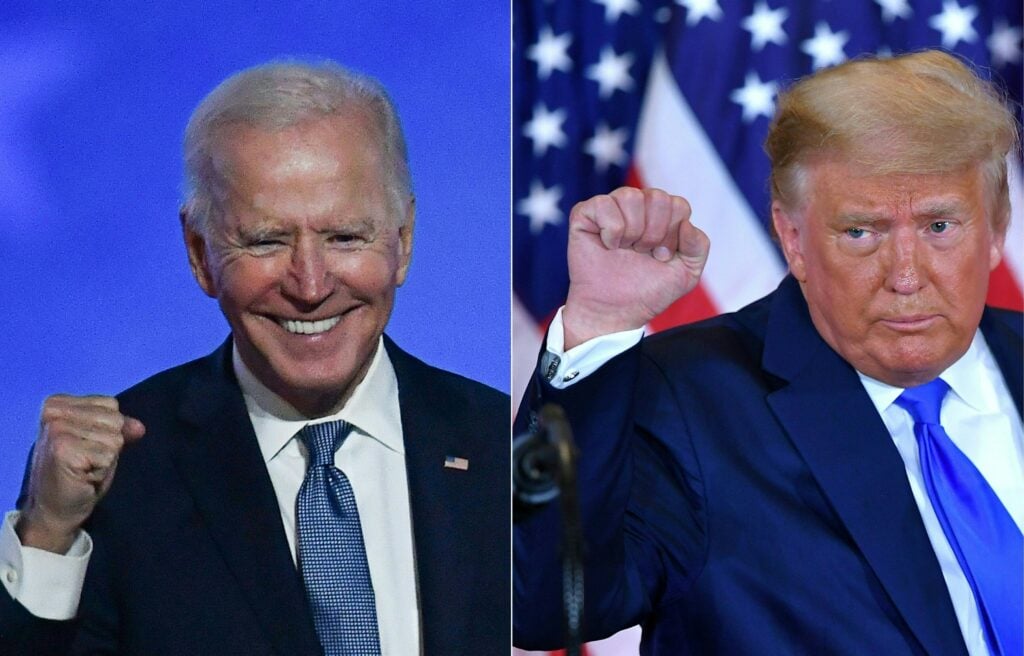 This combination of pictures created on November 04, 2020 shows Democratic presidential nominee Joe Biden (L) in Wilmington, Delaware, and US President Donald Trump (R) in Washington, DC both pumping their fist during an election night speech early November 4, 2020. 
