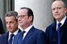 French President Francois Hollande (C) poses with former president and current UMP conservative political party head Nicolas Sarkozy (L) and former prime minister Alain Juppe, in Paris January 11, 2015. President Hollande and former president Sarkozy took part in a solidarity march (Marche Republicaine) in tribute to the victims following the shootings by gunmen at the offices of the satirical weekly newspaper Charlie Hebdo, the killing of a police woman in Montrouge, and the hostage taking at a kosher supermarket at the Porte de Vincennes, which claimed 17 lives. Picture taken January 11, 2015. REUTERS/Pascal Rossignol (FRANCE - Tags: POLITICS) REUTERS/Pascal Rossignol 