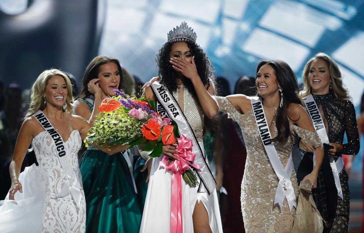 Miss District of Columbia USA Kara McCullough reacts after she was crowned the new Miss USA during the Miss USA contest Sunday, May 14, 2017, in Las Vegas. (AP Photo/John Locher)