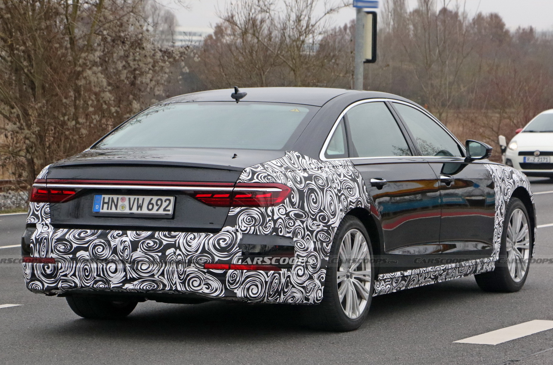 Опубликованы первые снимки обновленной Audi A8 Опубликованы первые снимки обновленной Audi A8 Новости