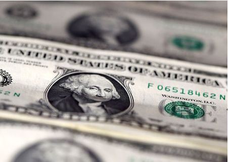 U.S. dollar notes are seen in this November 7, 2016 picture illustration. REUTERS/Dado Ruvic/Illustration/File Photo