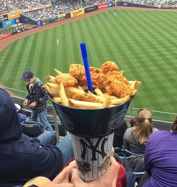 Bowl Of Chicken And Fries, With A Straw To Your Soda Through The Center. One Hand Holds All The Things, So You Can Eat With The Other