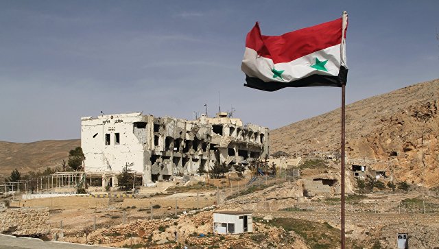 Разрушенное здание в Сирии
