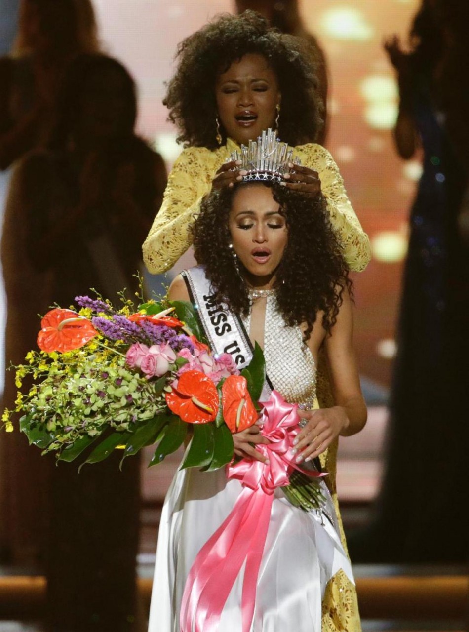 Miss District of Columbia USA Kara McCullough reacts as she is crowned the new Miss USA by former Miss USA Deshauna Barber during the Miss USA contest Sunday, May 14, 2017, in Las Vegas. (AP Photo/John Locher)