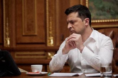 Ukraine's President Volodymyr Zelenskiy is seen during a call with U.S. President Joe Biden in Kyiv, Ukraine January 27, 2022. Picture taken January 27, 2022. Ukrainian Presidential Press Service/Handout via REUTERS ATTENTION EDITORS - THIS IMAGE WAS PROVIDED BY A THIRD PARTY.