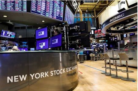 A nearly empty trading floor is seen as preparations are made for the return to trading at the New York Stock Exchange (NYSE) in New York, U.S., May 22, 2020. REUTERS/Brendan McDermid