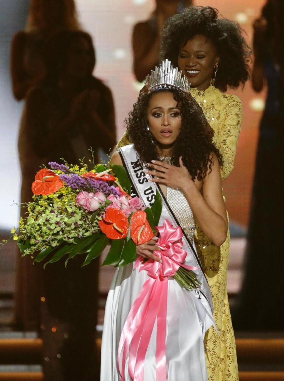 Miss District of Columbia USA Kara McCullough reacts as she is crowned the new Miss USA by former Miss USA Deshauna Barber during the Miss USA contest Sunday, May 14, 2017, in Las Vegas. (AP Photo/John Locher)