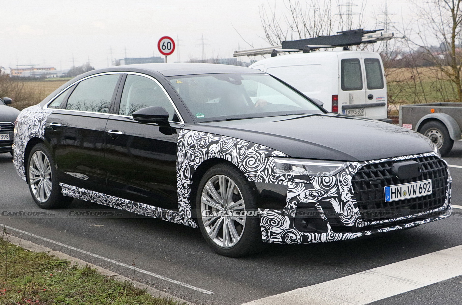 Опубликованы первые снимки обновленной Audi A8 Опубликованы первые снимки обновленной Audi A8 Новости