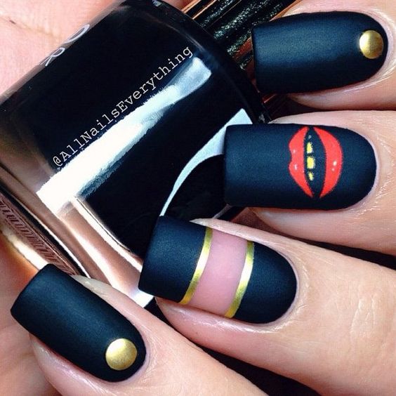Chick looking winter nail art design. Paint your nails in blue metallic nail polish with hints of gold metallic here and there. Add gold beads and a sexy lips detail for accent.