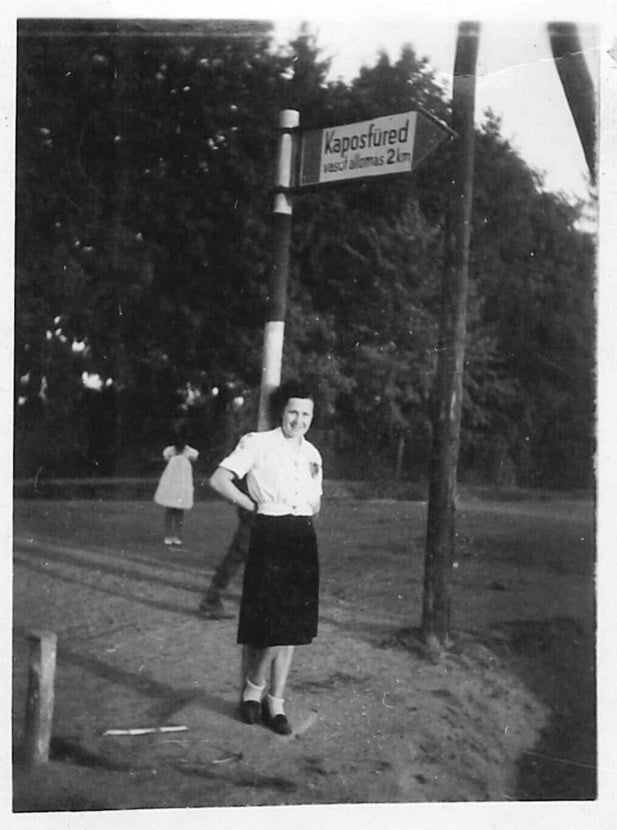 "The photograph was taken in 1943 in Kaposfüred, Hungary. My mother is in the foreground, the photo taken by my father. A little girl standing in the background, has no arms, no face. It’s like a ghost or a demon. I have the original photograph at home." – Szigeti Gyöngyi via paranormal360.co.uk