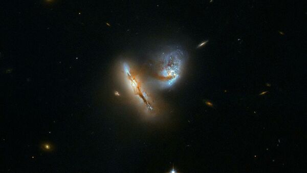 Двойная галактика UGC 2369 в созвездии Овна, похожая на будущий союз Млечного Пути и Туманности Андромеды