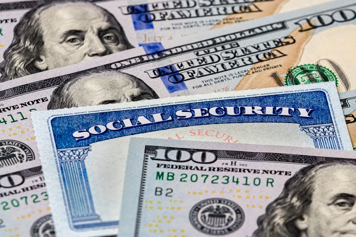 Social Security card in money. 
