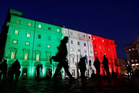 FILE PHOTO: Members of the media wait outside Prime Minister's office, Chigi Palace, in Rome, Italy, January 13, 2021. REUTERS/Remo Casilli/File Photo