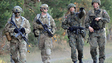 Солдаты польской армии и армии США во время учений НАТО Анаконда-2016 на территории Польши. 7 июня 2016