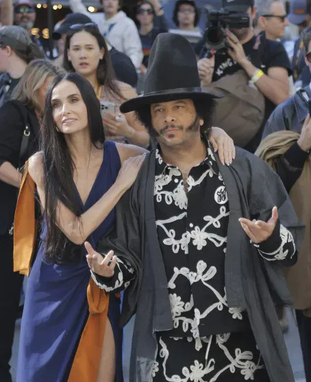 Деми Мур и Бутс Райли