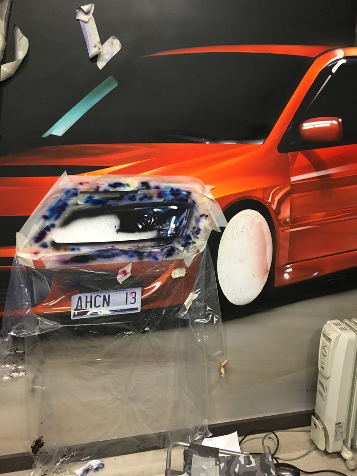 Оформление стены: автомобиль Mitsubishi Lancer Evo. 