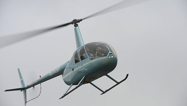 Вертолет Robinson 44. Архивное фото