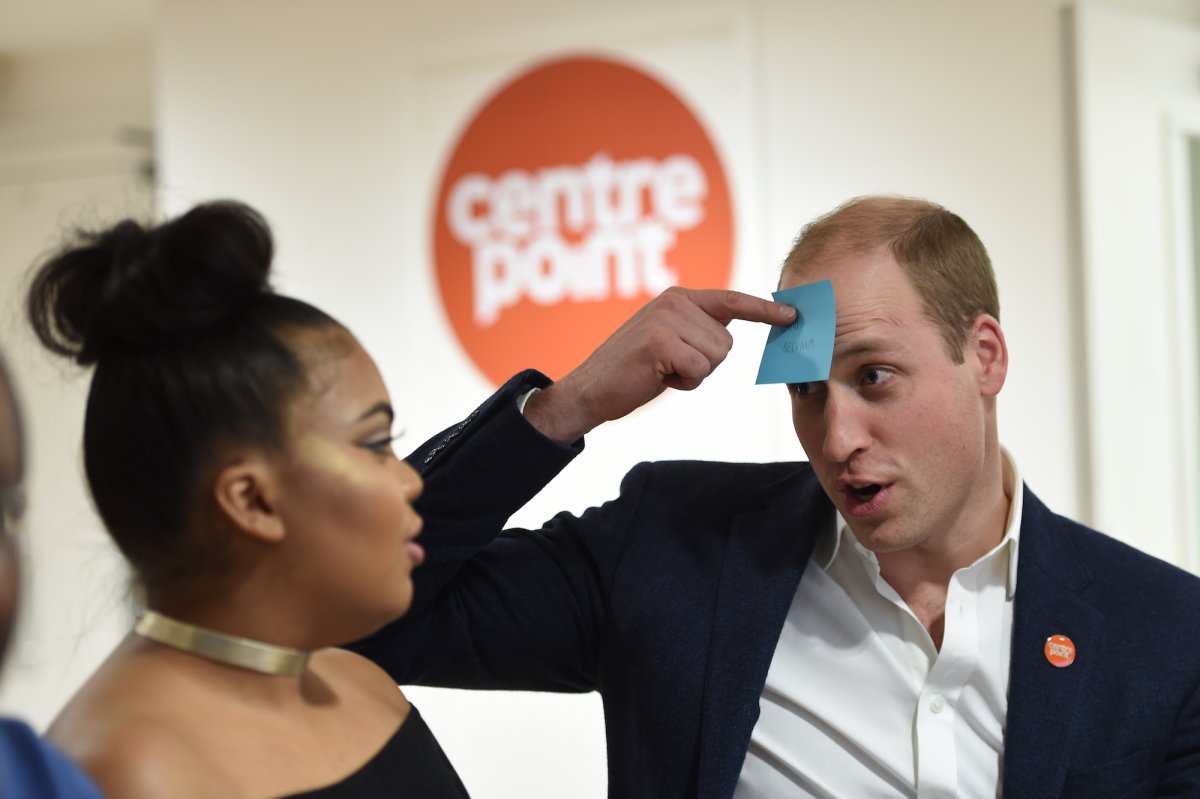In January Prince William made a solo venture to Centre Point, a homelessness charity in London. Here he plays a game with a young woman being helped by the charity (he has to guess the name on the note — which says 