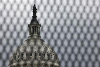 The U.S. Capitol building is seen behind security fencing that has been up around the building since shortly after the January 6, 2021 siege, after legislation to create a bipartisan commission to investigate the January 6 assault by supporters of former President Donald Trump failed by a vote of 54-35 due to a Republican filibuster, on Capitol Hill in Washington, May 28, 2021. REUTERS/Evelyn Hockstein 