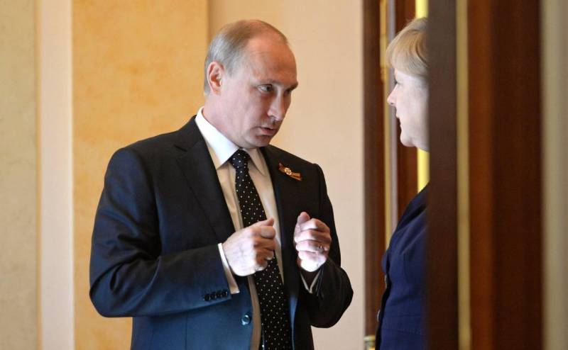 Читатели британской прессы предполагают, что Путин обсудит с Меркель раздел Украины Новости