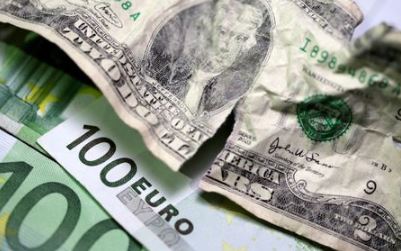 U.S. dollar and Euro banknotes are seen in this picture illustration taken May 3, 2018. REUTERS/Dado Ruvic/Illustration