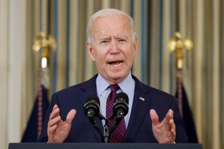 FILE PHOTO: U.S. President Joe Biden delivers remarks on the U.S. debt ceiling from the State Dining Room of the White House in Washington, U.S. October 4, 2021. REUTERS/Jonathan Ernst/File Photo