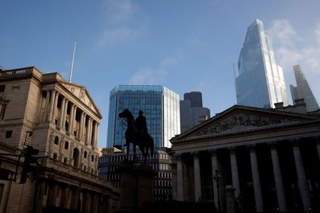 FILE PHOTO: A general view shows The Bank of England and the City of London financial district, amid the outbreak of the coronavirus disease (COVID-19), in London, Britain, November 5, 2020. REUTERS/John Sibley