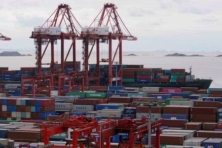 Containers are seen at the Yangshan Deep-Water Port in Shanghai, China October 19, 2020. REUTERS/Aly Song