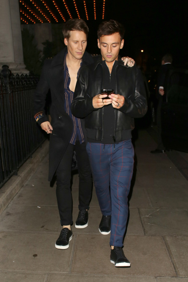 Dustin Lance Black and Tom Daley texted while walking.