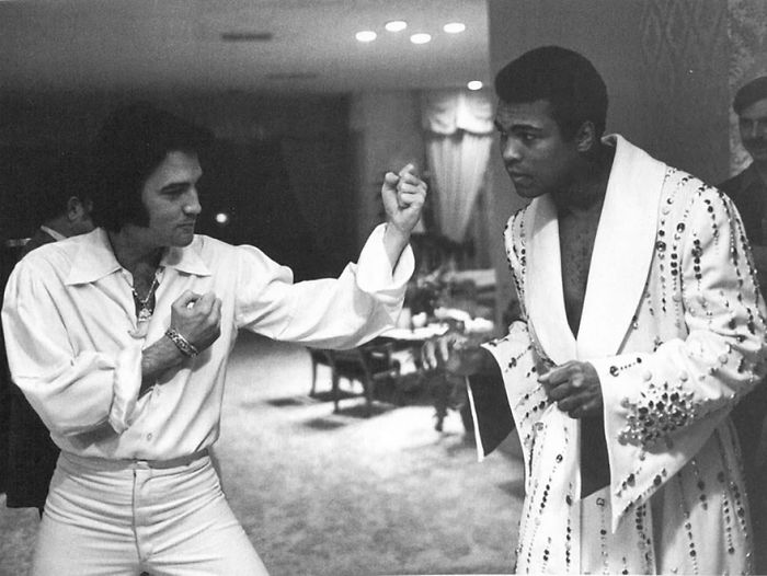 Elvis And Ali In The Kings Hilton Hotel Suite In 1973 Where Elvis Presented Ali A Special One Of A Kind Robe Designed Just Like Famous Stage Jumpsuits