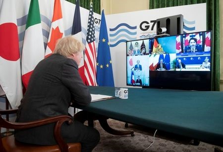 Britains Prime Minister Boris Johnson hosts the Online G7 Summit in the Cabinet Room at Downing Street in London, Britain February 19, 2021. Geoff Pugh/Pool via REUTERS
