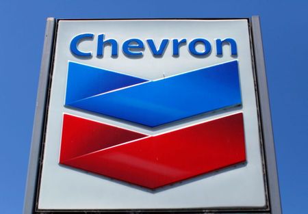 A Chevron gas station sign is seen in Del Mar, California, April 25, 2013. Chevron will report earnings on April 26. REUTERS/Mike Blake