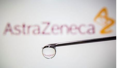 FILE PHOTO: AstraZenec's logo is reflected in a drop on a syringe needle in this illustration taken November 9, 2020. REUTERS/Dado Ruvic/Illustration/File Photo