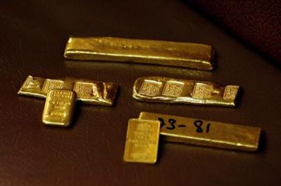 Gold ingots, inscribed with details, are displayed at a wholesale gold shop, as the coronavirus disease (COVID-19) outbreak continues, in Peshawar, Pakistan August 6, 2020. REUTERS/Fayaz Aziz