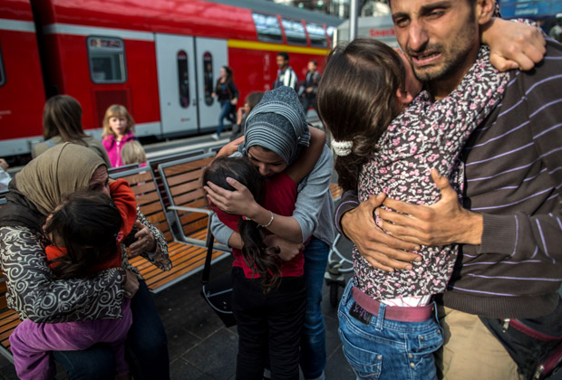 Мигранты из Сирии на вокзале в Германии. 18 сентября 2015