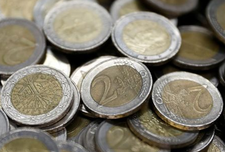 Two Euro coins are seen at the Money Service Austria company's headquarters in Vienna, Austria, November 16, 2017. REUTERS/Leonhard Foeger