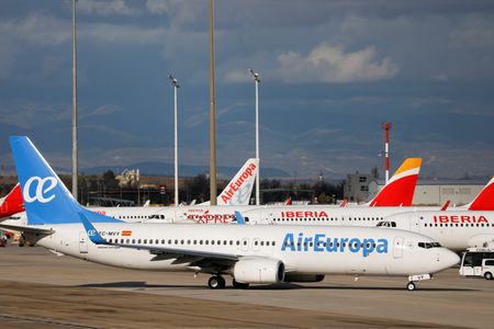 Iberia and Air Europa planes parked at Adolfo Suarez Barajas airport during the COVID-19 pandemic in Madrid, Spain, December 15, 2020. REUTERS/Susana Vera/File Photo 