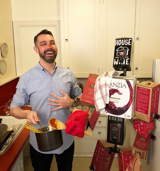 Single man builds boyfriend out of boxes of wine