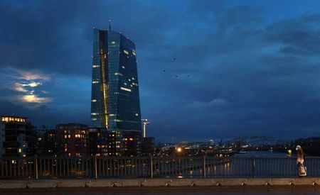 A woman walks past the European Central Bank (ECB) headquarter as the spread of the coronavirus disease (COVID-19) continues during an extended lockdown and a demand by the German government for more home office possibilities in Frankfurt, Germany, January 28, 2021. REUTERS/Kai Pfaffenbach
