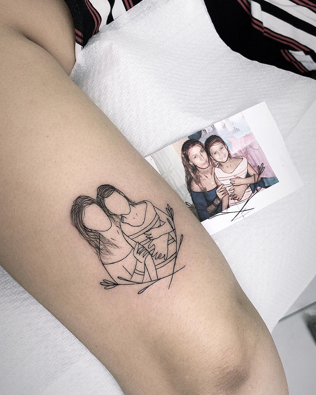 Татуировки в виде матери и ребёнка фото 1
