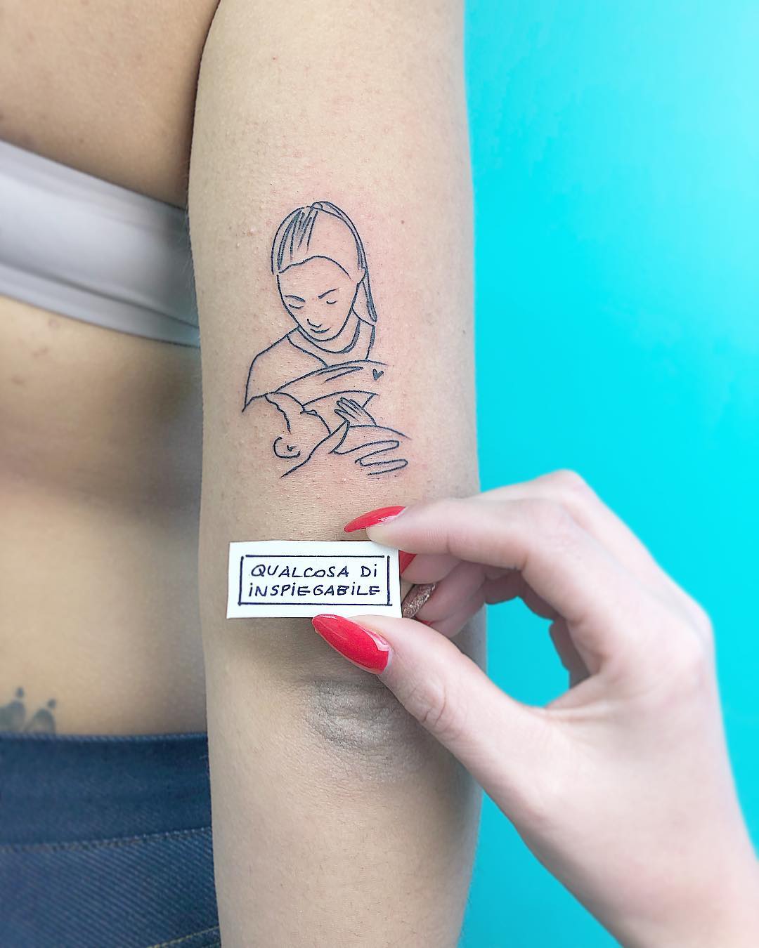 Татуировки в виде матери и ребёнка фото 5