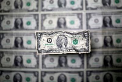 U.S. dollar banknote is seen in this picture illustration taken May 3, 2018. REUTERS/Dado Ruvic/Illustration