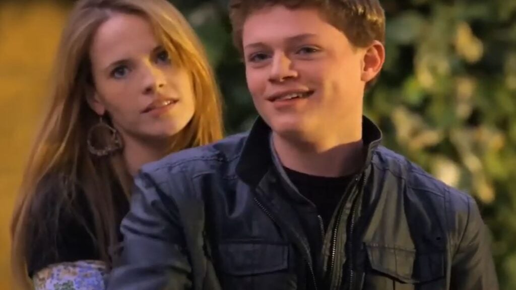 Daphne Vasquez (Katie Leclerc) and Emmett Bledsoe (Sean Berdy) get on Emmett's motorcycle and prepare to leave the house. - Switched at Birth Freeform Promo Screenshot