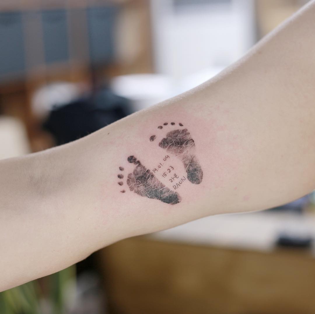 Татуировки в виде матери и ребёнка фото 3