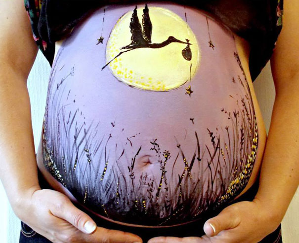Беременный боди-арт:
красочные рисунки 
на животах