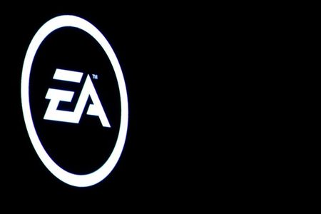 FILE PHOTO: The Electronic Arts Inc., logo is displayed on a screen during a PlayStation 4 Pro launch event in New York City, U.S., September 7, 2016. REUTERS/Brendan McDermid