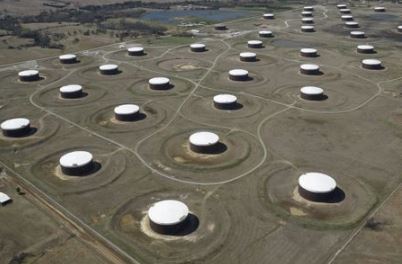 FILE PHOTO: Crude oil storage tanks are seen from above at the Cushing oil hub, in Cushing, Oklahoma, March 24, 2016. REUTERS/Nick Oxford/File Photo
