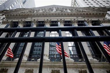 FILE PHOTO: The front facade of the New York Stock Exchange (NYSE) is seen in New York City, U.S., May 4, 2021. REUTERS/Brendan McDermid/File Photo 