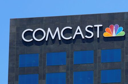 FILE PHOTO: The Comcast NBC logo is shown on a building in Los Angeles, California, U.S. June 13, 2018. REUTERS/Mike Blake